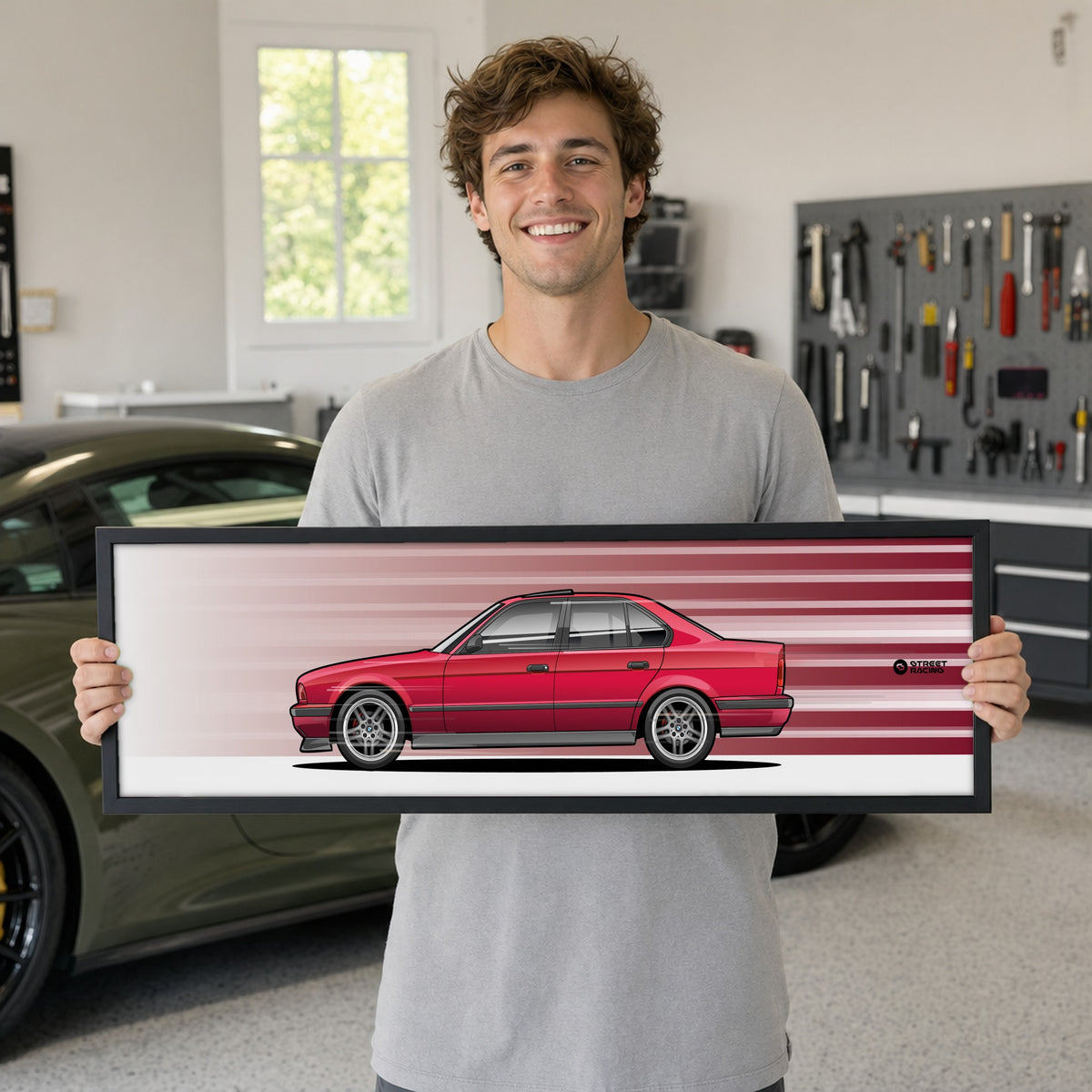 Cuadro arte en movimiento BMW 540i E34 color Calypso Red en manos de una persona – StreetRacing