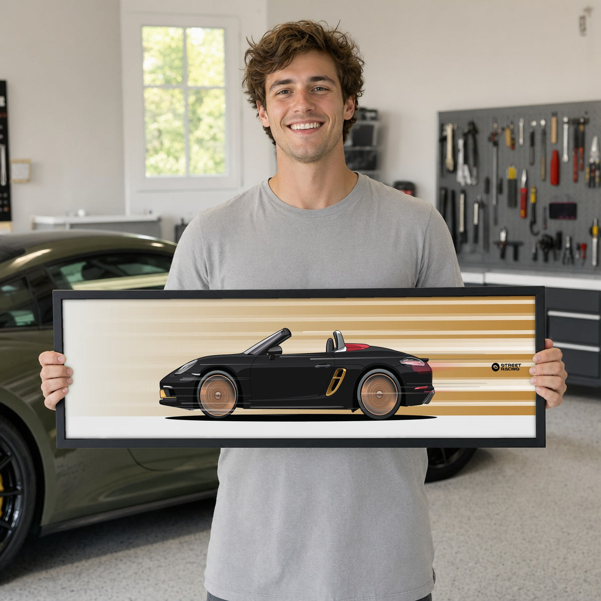 Cuadro arte en movimiento Porsche 718 Boxster 25 Years color Jet Black en manos de una persona – StreetRacing