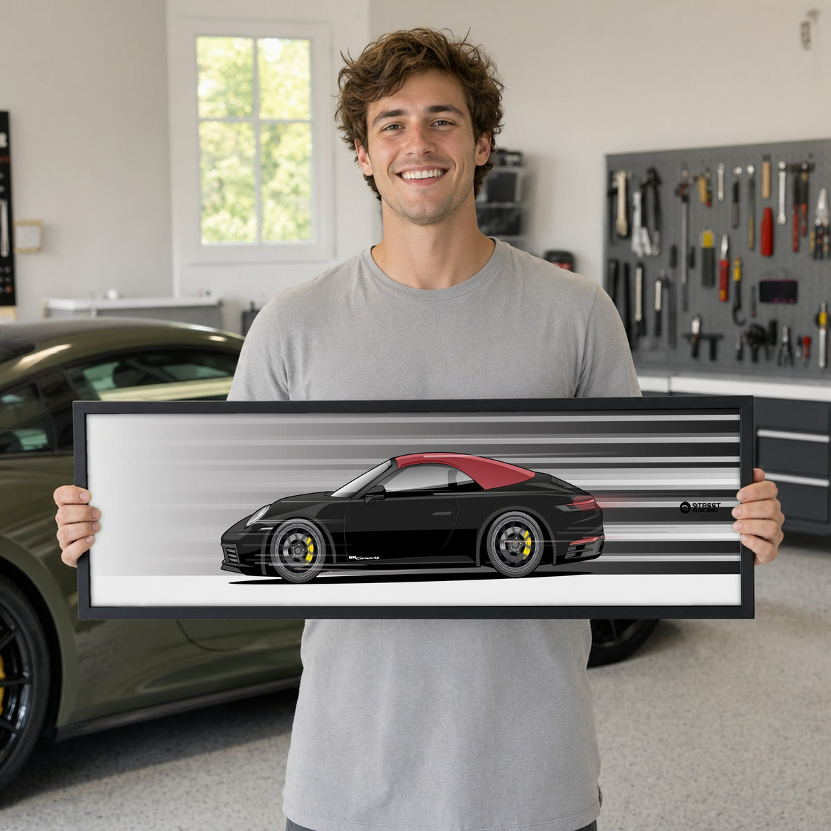 Cuadro arte en movimiento Porsche 911 Carrera Cabriolet 2024 color Black en manos de una persona – StreetRacing