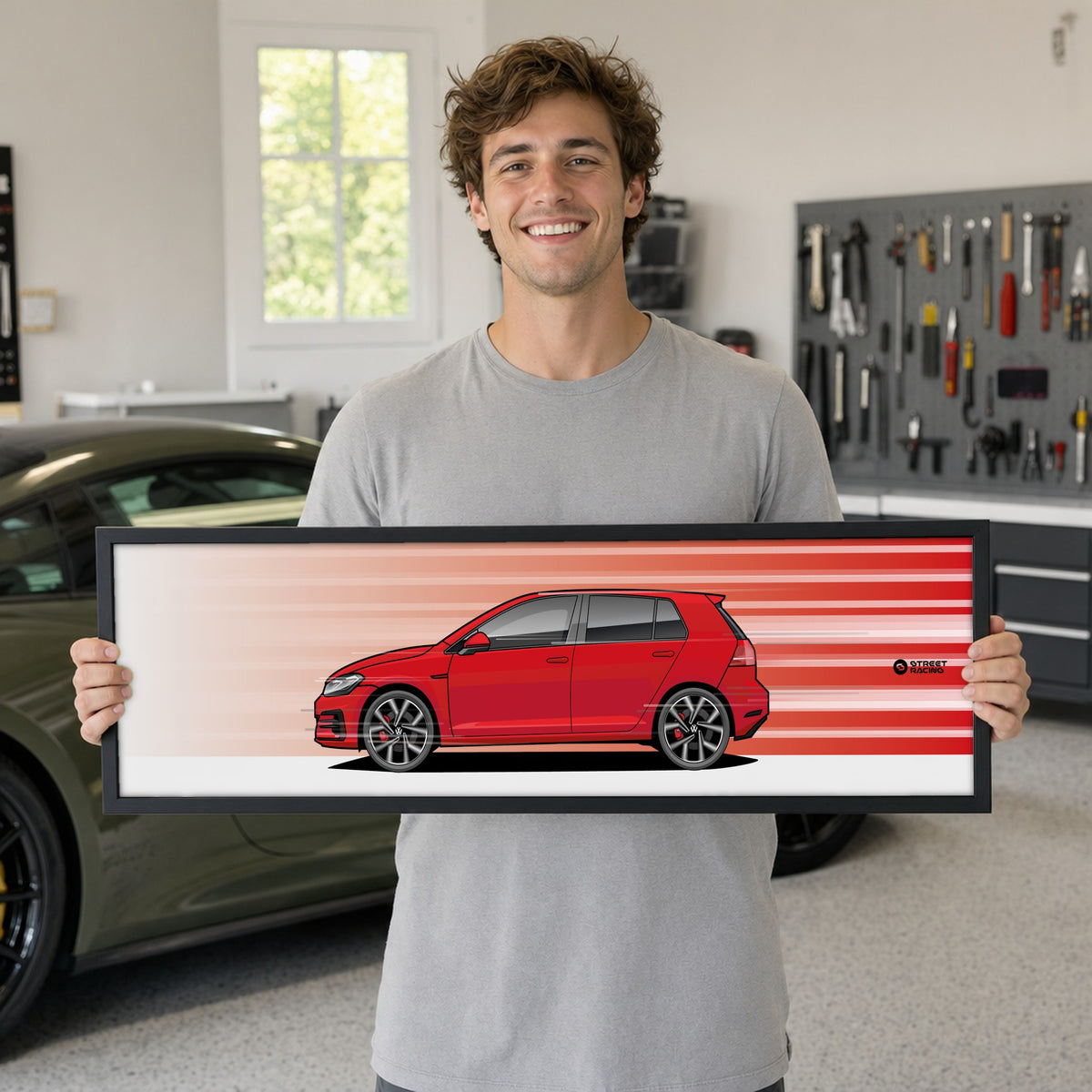 Cuadro arte en movimiento Volkswagen Golf GTI MK7.5 color Tornado Red en manos de una persona – StreetRacing